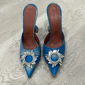 Amina Muaddi blue mules